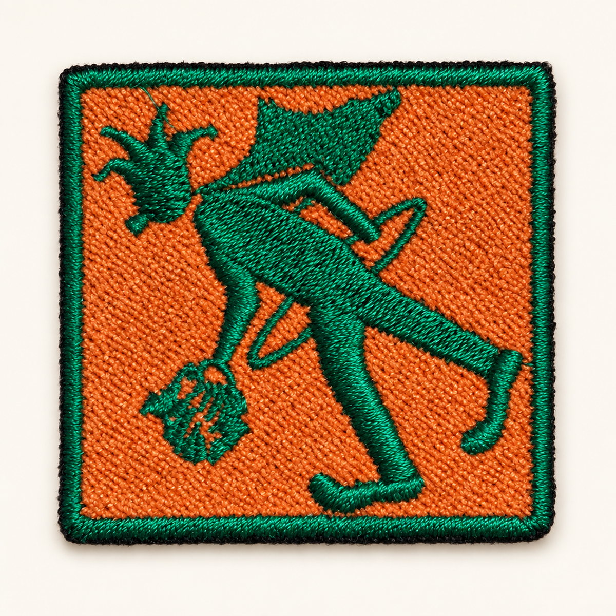 Emerald green and orange 2-inch square Prankster embroidered iron-on patch