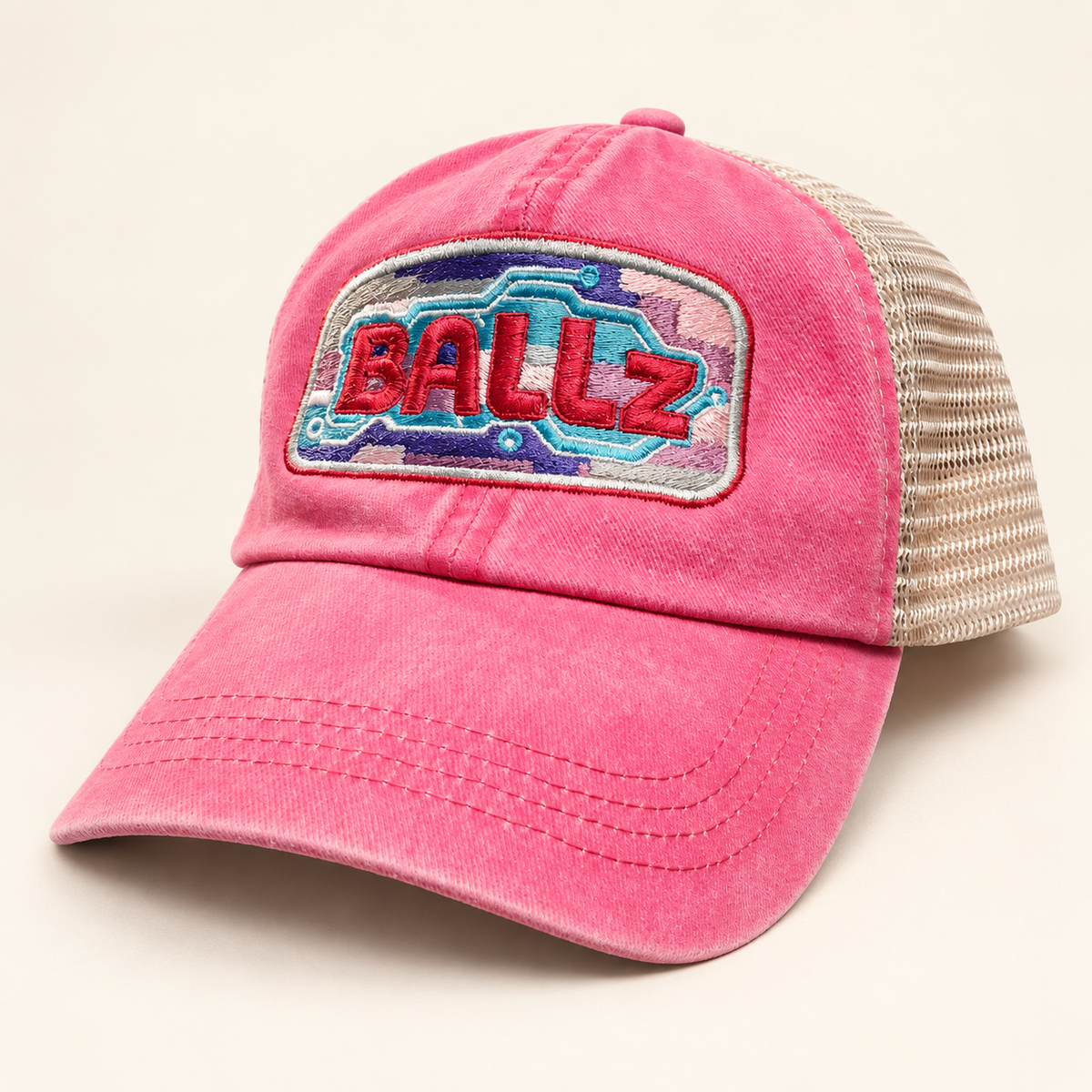 Three-quarter front view of the hot pink BALLz embroidered cap with a light tan mesh back.