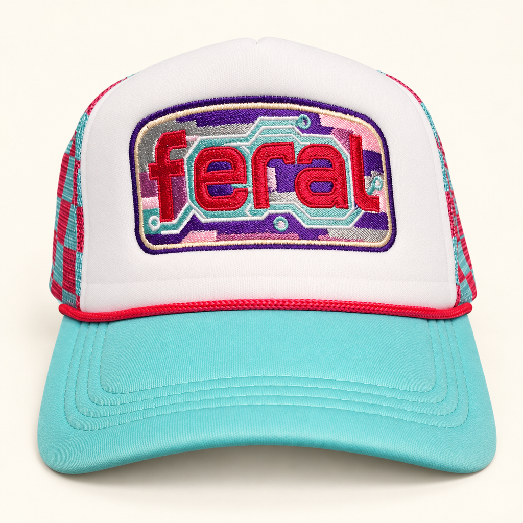 Front view of the FERAL cassette embroidered trucker hat with an aqua brim, hot-pink rope, and teal-and-hot-pink gingham mesh.