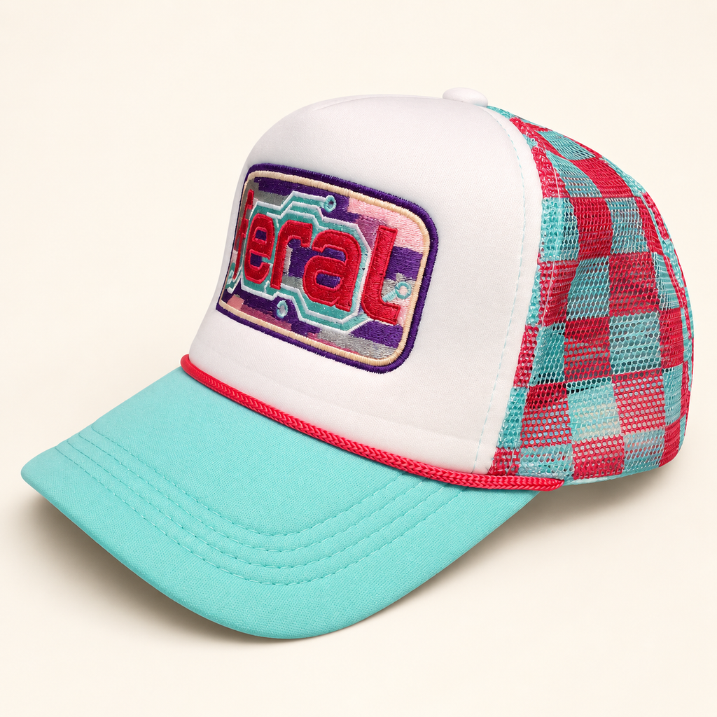 Opposite three-quarter view of the aqua FERAL trucker hat showing its hot-pink rope and teal-and-hot-pink gingham mesh.