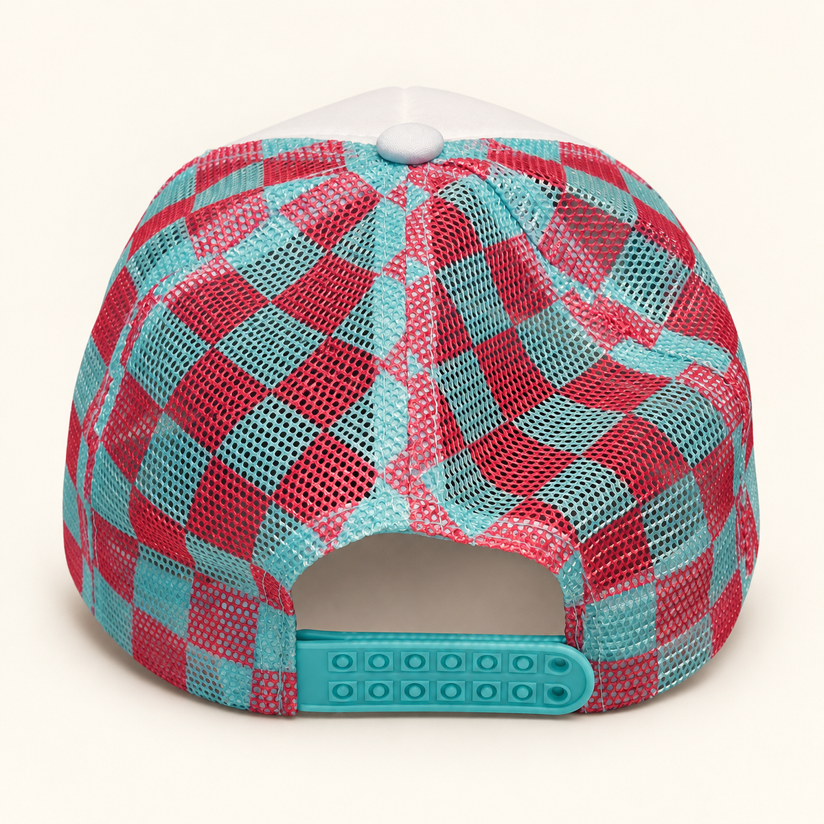 Rear view of the FERAL trucker hat showing teal-and-hot-pink gingham mesh and the adjustable teal snapback closure.